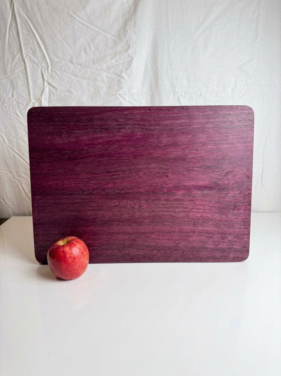 Purple Heart Cutting Board — Large 12x17 Standing with Apple for Scale