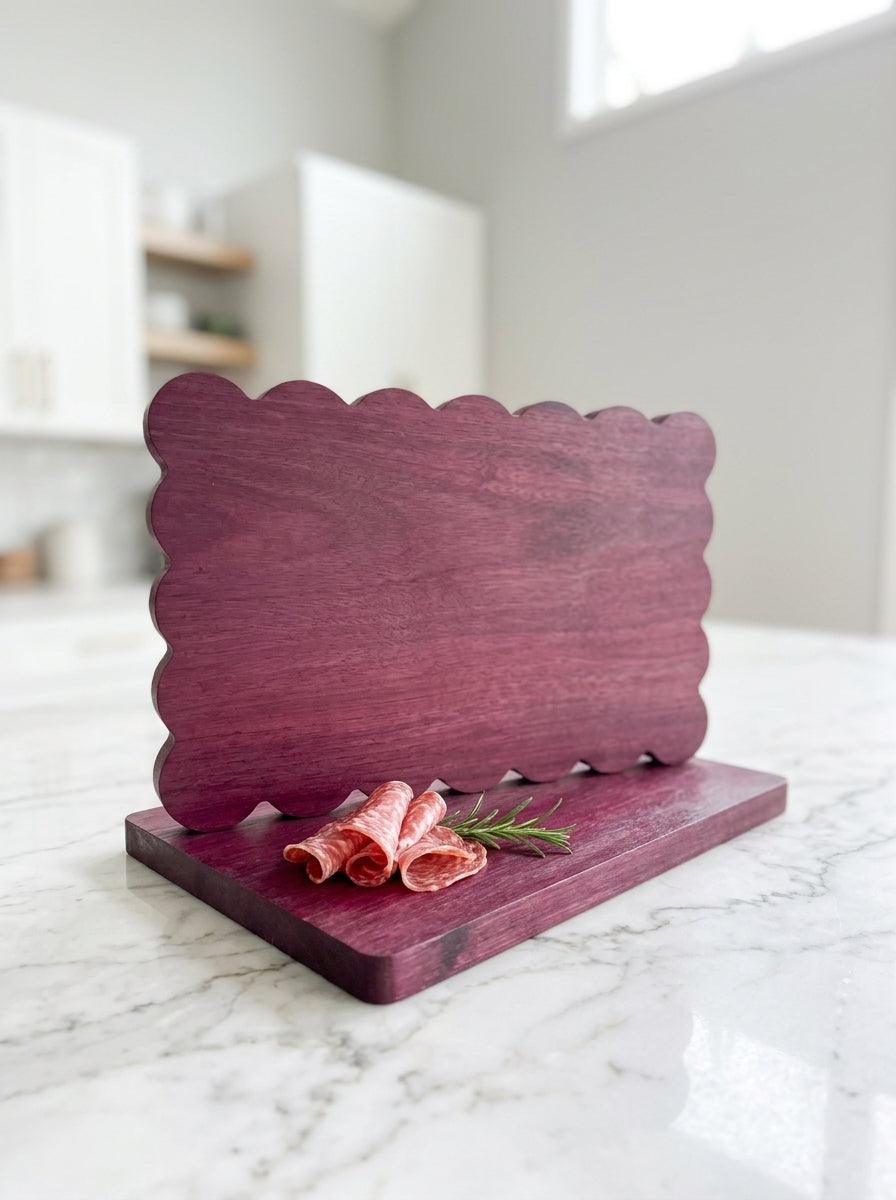 Purple heart scalloped charcuterie board with salami rosemary