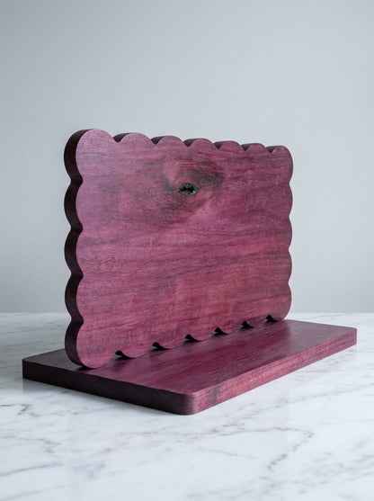 Purple heart scalloped charcuterie board three quarter angle