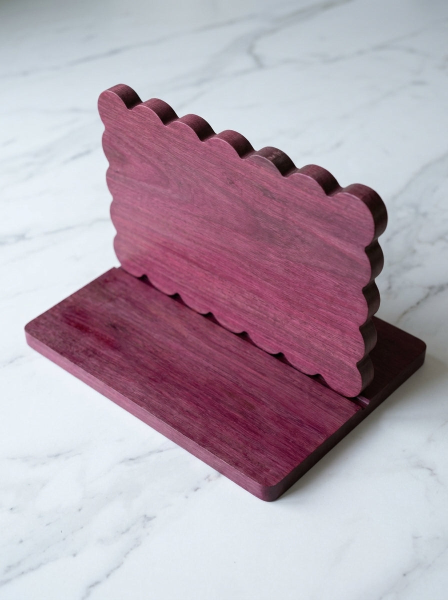 Purple heart scalloped charcuterie board overhead view