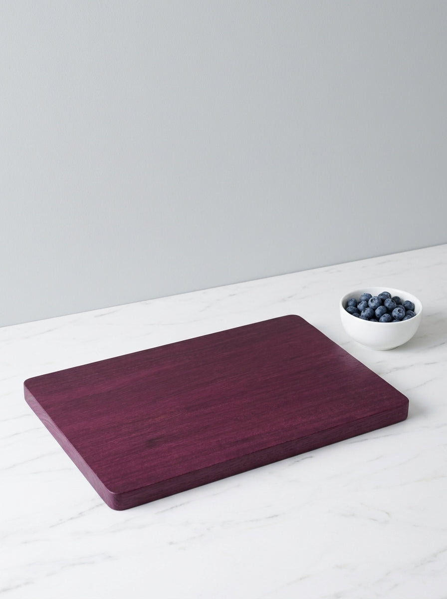 Purple heart cutting board with fresh blueberries