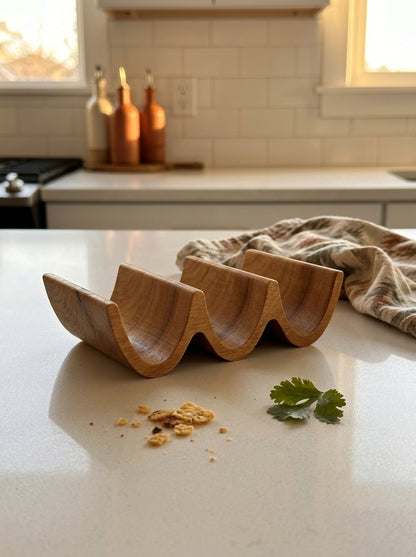 Empty solid wood taco holder after taco night, clean surface showing durable food-safe finish